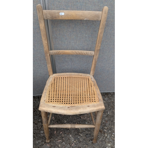 1467 - An Unmatching Pair Of Rush Seated Chairs