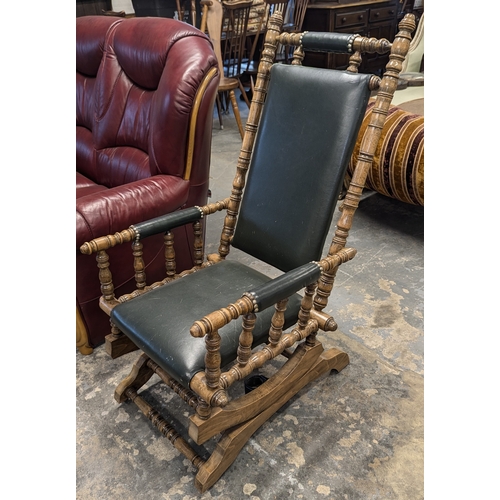 36 - A Bobbin Turned Green Leather Rocking Chair