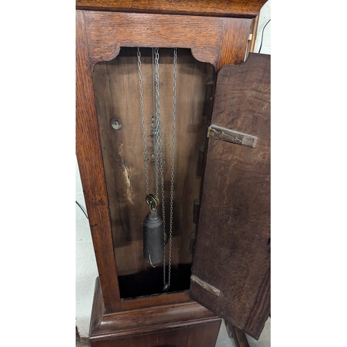 39 - An Oak Cased Grandfather Clock With Painted Dial - Running