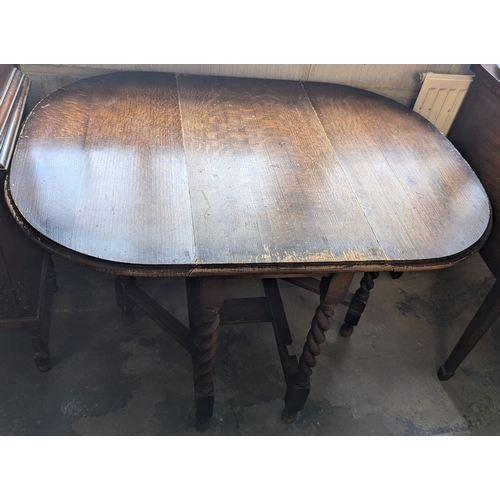 1034 - A Small Gateleg Table With Barley Twist Legs