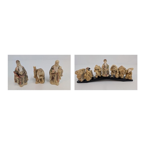 33 - 10 x Japanese Imortals Netsuk - Highly Decorative on Steps with 3 standing beside.  Each Figure appr... 