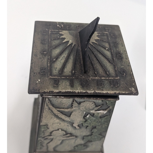 91 - Huntley and Palmer Biscuit Tin 1913 in the form of a Stone Column with Winged Cherubs, Bats and Bird... 