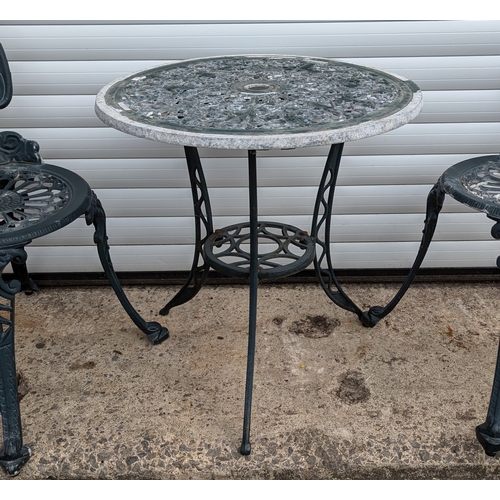 872 - A Green Metal Bistro Table And 2 Chairs