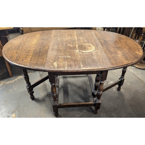 1539 - An Oak Gateleg Table - 150 x 75 x 98cm Fully Extended