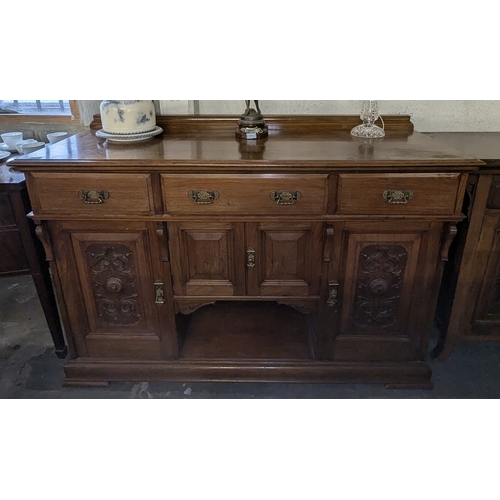 161 - A Late Victorian Mahogany Sideboard With Three Drawers Over A Pair Of Cabinet Drawers Flanked By Lar... 