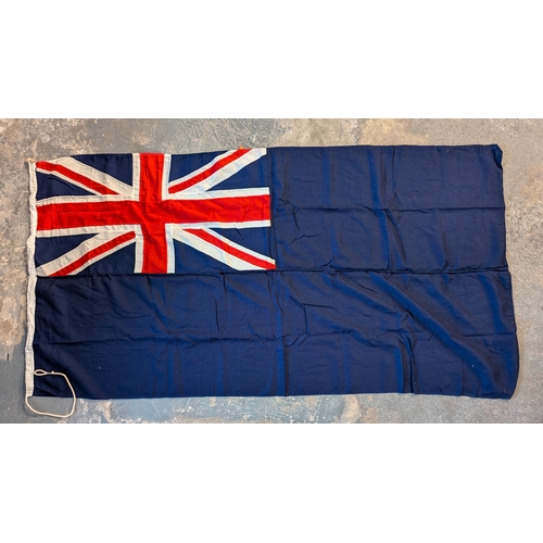 17 - A Captain O.M. Watts Blue Linen Ensign Flag - Approximately 88 x 180cm