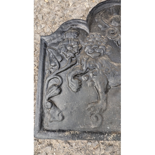 44 - Heavy Cast Iron Reproduction Fire Back Featuring A Lion With Tudor Rose, Fleur De Lys And A Thistle ... 