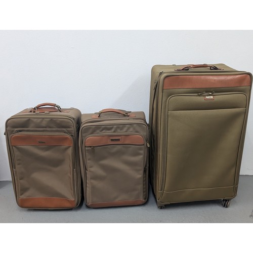 138 - Genuine Hartman Expandable Luggage - Near New Condition - Olive Green. Large Case with Brown Handle ... 