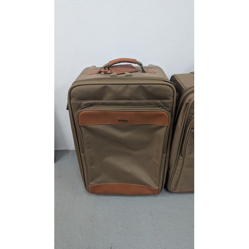 138 - Genuine Hartman Expandable Luggage - Near New Condition - Olive Green. Large Case with Brown Handle ... 