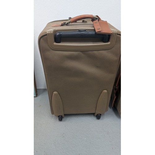 138 - Genuine Hartman Expandable Luggage - Near New Condition - Olive Green. Large Case with Brown Handle ... 