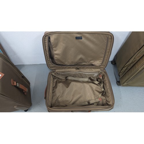 138 - Genuine Hartman Expandable Luggage - Near New Condition - Olive Green. Large Case with Brown Handle ... 