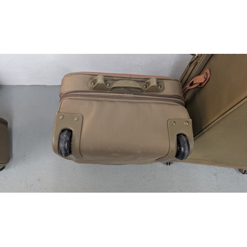 138 - Genuine Hartman Expandable Luggage - Near New Condition - Olive Green. Large Case with Brown Handle ... 