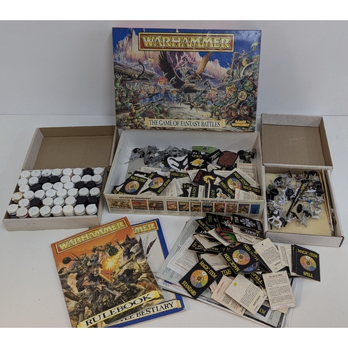 585 - An Assortment of Warhammer Games Workshop Miniatures , Paints  and Gaming Equipment