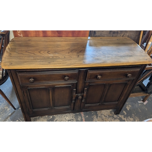 132 - An Ercol Sideboard