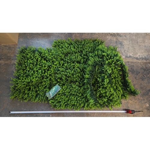 1562 - A Quantity Of Plastic Plant Wall Foliage