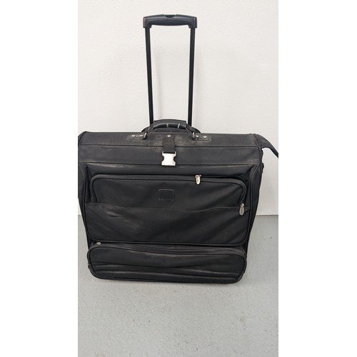 140 - A Dakota Large Black Rolling Garment/ Wardrobe Bag.  Excellent Condition.  Approx 60cm Tall, 60cm Wi... 