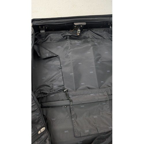 140 - A Dakota Large Black Rolling Garment/ Wardrobe Bag.  Excellent Condition.  Approx 60cm Tall, 60cm Wi... 