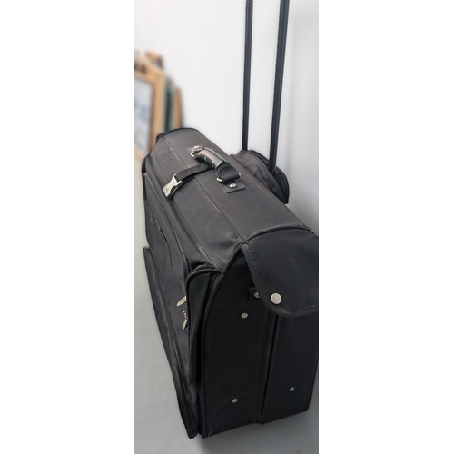 140 - A Dakota Large Black Rolling Garment/ Wardrobe Bag.  Excellent Condition.  Approx 60cm Tall, 60cm Wi... 