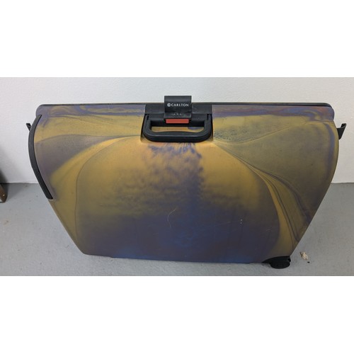 937 - Carlton Hardshell Suitcase - Good Condition  60cm High, 72cm Wide, 22cm Depth.  Comination Code 747