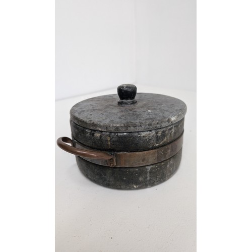 150 - An Antique Soapstone Stew Pot with Brass Banding and Handles 18cm Diameter, 9cm Height.  Can withsta... 