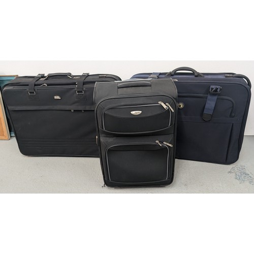 938 - A Selection of 3 x Suitcases/ Luggage Carriers and a Holdall - All In Good Condition