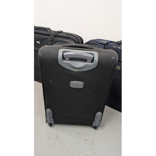 938 - A Selection of 3 x Suitcases/ Luggage Carriers and a Holdall - All In Good Condition