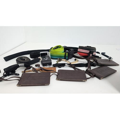 940 - A Collection of Luggage Tags and Straps