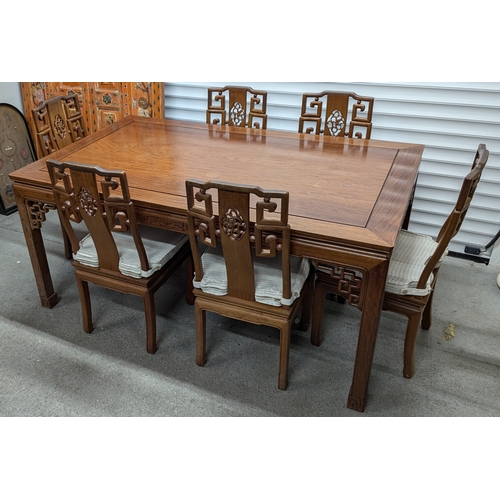 48 - .A Chinese Rosewood Dining Table and 6 x Chairs Imported from Hong Kong . Table 168cm Long, 102 wide... 