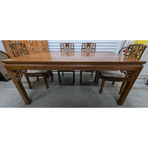 48 - .A Chinese Rosewood Dining Table and 6 x Chairs Imported from Hong Kong . Table 168cm Long, 102 wide... 