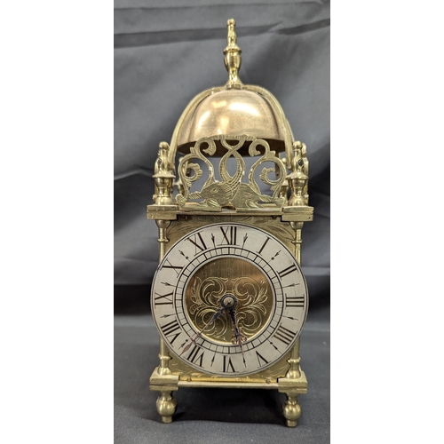 19 - A French Brass Lantern Clock with Key - Running 27cm Tall