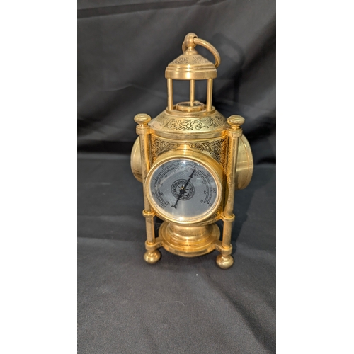 75 - A Triple Faced Clock, Barometer, Thermometer and Compass 25cm High