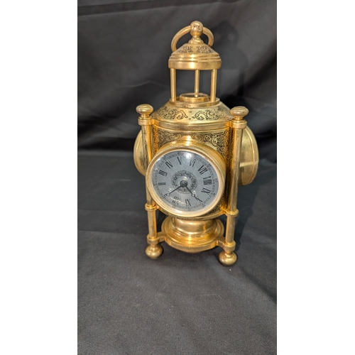 75 - A Triple Faced Clock, Barometer, Thermometer and Compass 25cm High