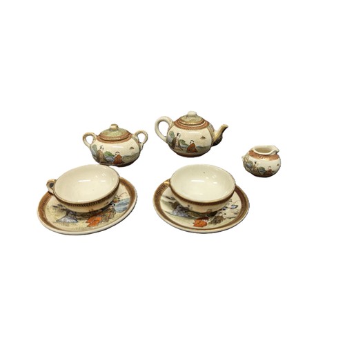 104 - An Antique Satsuma Dolls Tea Set ( Some Damage)