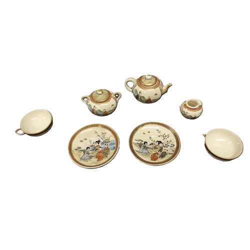 104 - An Antique Satsuma Dolls Tea Set ( Some Damage)