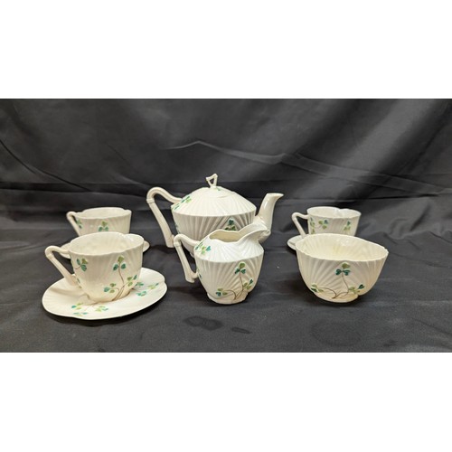 78 - An Antique Belleek Clover Leaf Pattern Tea Pot, Milk Jug, Sugar Bowl An 3x Cups And Saucers - Slight... 