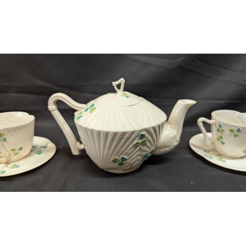 78 - An Antique Belleek Clover Leaf Pattern Tea Pot, Milk Jug, Sugar Bowl An 3x Cups And Saucers - Slight... 