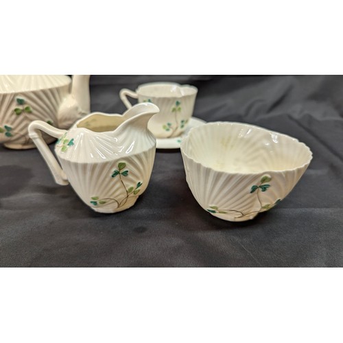 78 - An Antique Belleek Clover Leaf Pattern Tea Pot, Milk Jug, Sugar Bowl An 3x Cups And Saucers - Slight... 