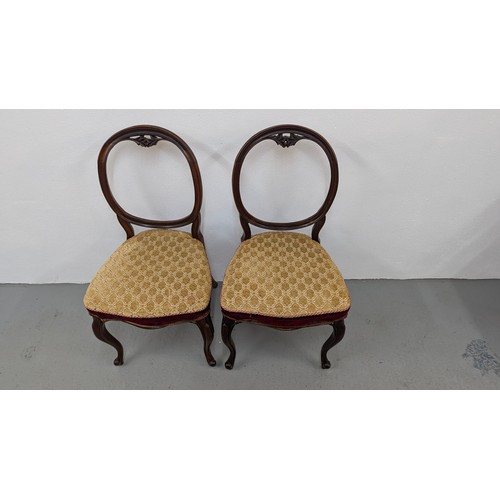 155 - A Pair of Victorian Balloon Backed Chairs