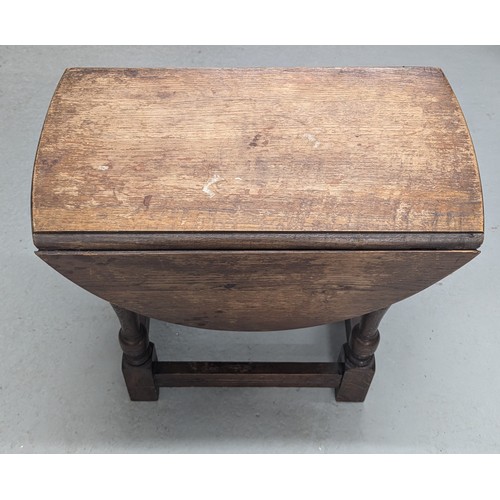 1590 - A Small Oak Twist Top Occasional Table