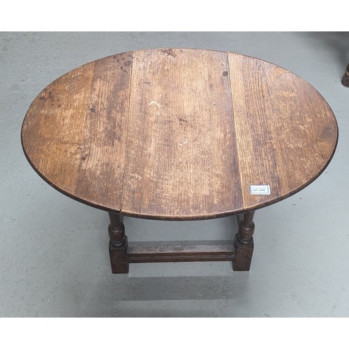 1590 - A Small Oak Twist Top Occasional Table