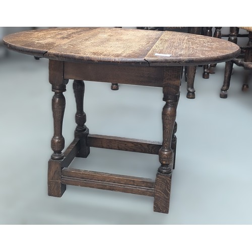 1590 - A Small Oak Twist Top Occasional Table