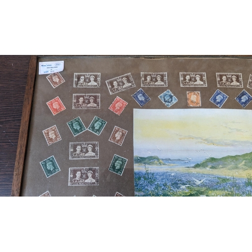 1116 - ....A framed picture containing collectable stamps and picture of sea lavender