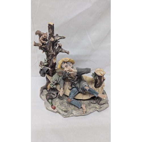 625 - .Capo-Di-Monte Porcelain Figures - Tramp On A Bench & Tramp In A Hammock - Both With Paperwork