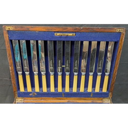 670 - *A Norman Hirst & Co. Canteen Of Cutlery Complete In Hardwood Case With Lift Up Lid And 2 Drawers - ... 