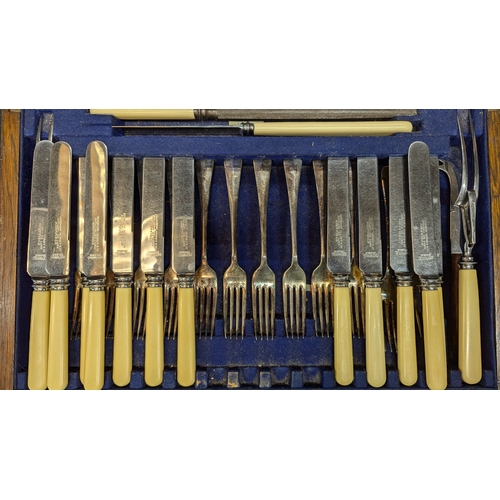 670 - *A Norman Hirst & Co. Canteen Of Cutlery Complete In Hardwood Case With Lift Up Lid And 2 Drawers - ... 