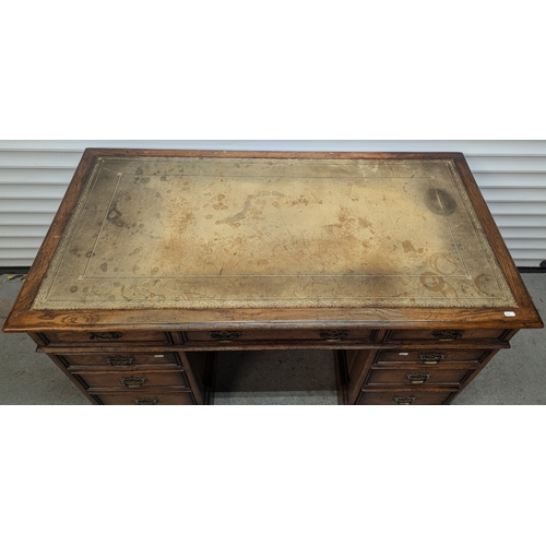 602 - Victorian Leather Topped 9 Drawer Desk With Brass Handles