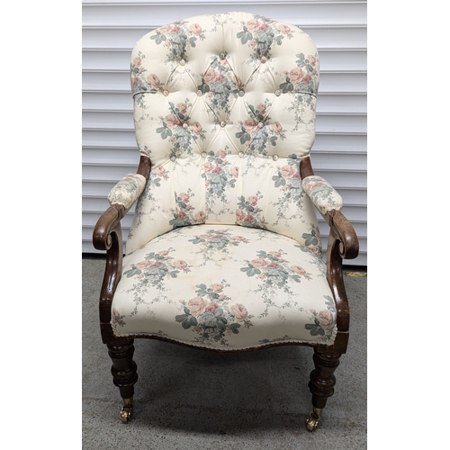 613 - A Victorian Walnut Button Back Armchair