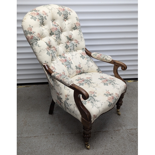 613 - A Victorian Walnut Button Back Armchair