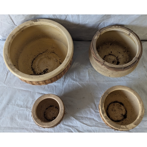 63 - A Nest Of Ceramic Pots With Wicker Style Wrapping - 4 In Total