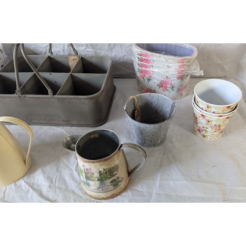 70 - A Selection Of Decorative Metalwares Including Jugs And Planters